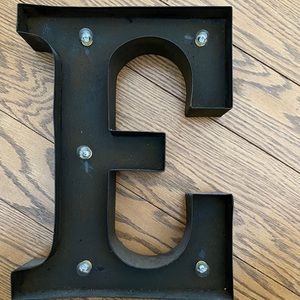 💡 “E” light-up house decor